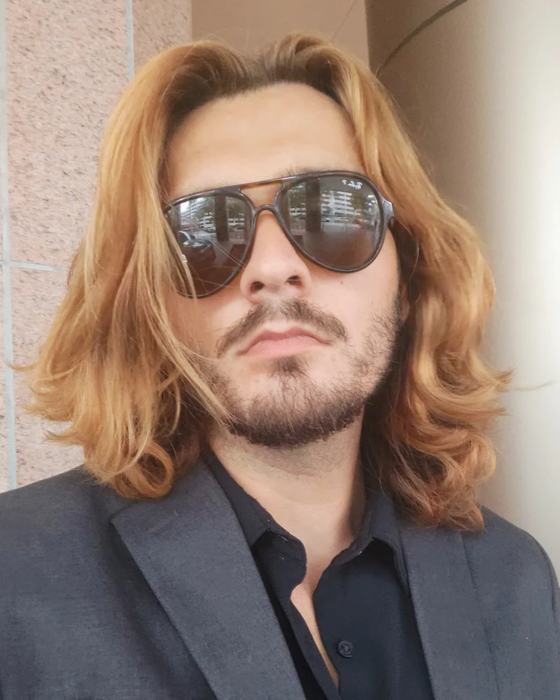 Rhett Ullmann in a charcoal blazer